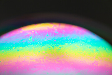 the beauty of the colorful pattern of soap bubbles is like a small planet