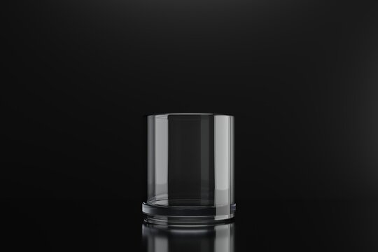 3D empty whiskey glass with light reflection isolated on black background. Realistic 3d rendering of whiskey glass. 