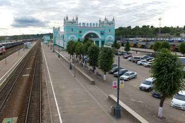 Fototapeta na wymiar View of the railway station of the city of Smolensk on a cloudy July evening