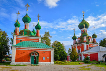 Fototapeta na wymiar Red Orthodox churches complex in Pereslavl-Zalessky city center