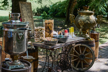 Rustic tea party with samovar, cookies and jam