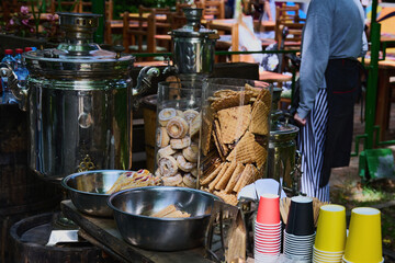 Rustic tea party with samovar, cookies and jam