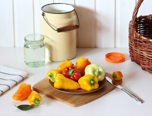 yellow and orange peppers on the table.