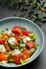salad with fresh vegetables and peach closeup. Fresh Summer Salad with Peaches and Buratta Cheese.