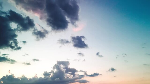 Sunset sky with blue and red colors, view from a drone in summer season