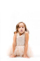 Portrait of happy pretty curly little girl standing and posing over white background