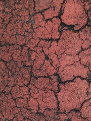 dry and cracked dark red background
