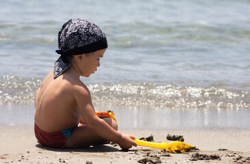 Healthy lifestyle. Boy on seashore