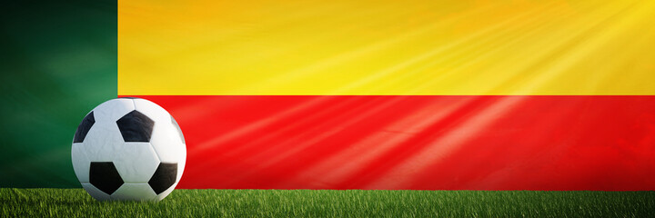 Obraz premium Creative football soccer ball on the flag of Benin, Football background, 3D Rendering.