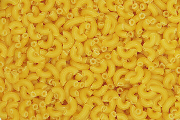 Italian pasta as background image. Image texture fresco macaroni. Top view