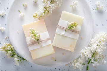 Obraz na płótnie Canvas Ecological lilac soap made of flowers. Lilac scent soap.