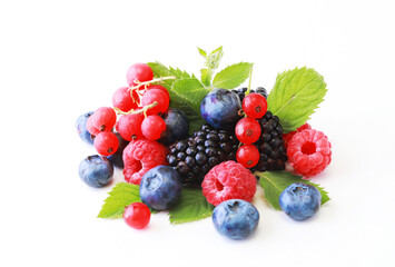 Fresh berries mix isolated on white background, top view. Strawberry, Raspberry, Red currant, Blueberry and Mint leaf