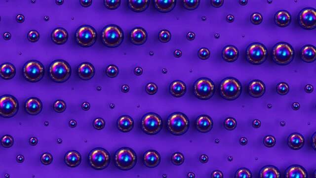 Moving holographic violet spheres on purple background, trendy minimal 3d looping animation, creative geometric pattern with iridescent round shapes, surreal modern contemporary backdrop