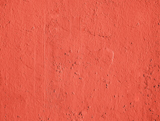 Red plastered rusty concrete wall.
