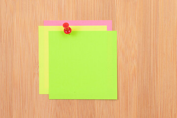 Colored Sticky Notes with Copyspace Pinned to the Wooden Message Board. To Do List Reminder in Office. Blank Memo Sticker at Work - Template. Empty Checklist - Mockup