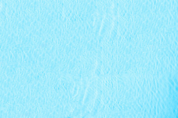 Blue transparent water surface in the swimming pool. Horizontal pool background. Aerial, drone view