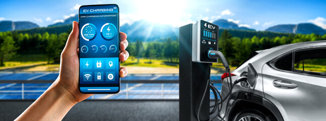 EV charging station for electric car with mobile app display charger status . The electric power is produced from sustainable resources to supply to charger station in order to reduce CO2 emission .