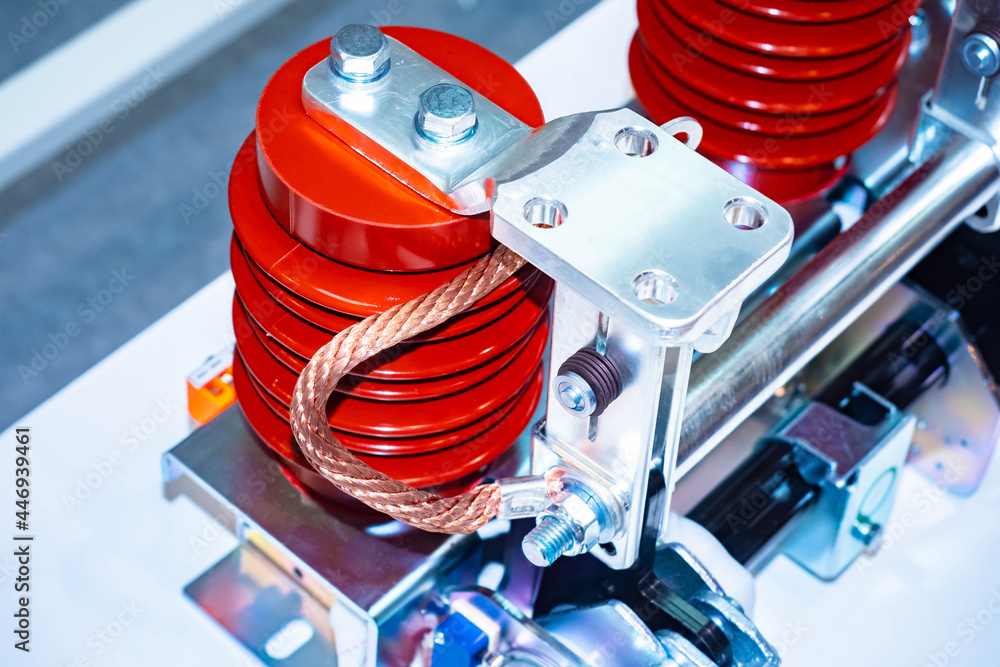 Poster red current transformers. two current transformers close-up. abstract equipment mechanism with a tra