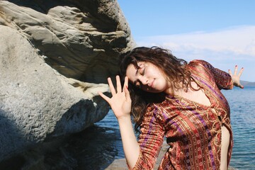 portrait of turkish woman dancing sensually in nature with traditional anatolian costume *3
