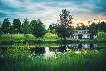 Pastoral scenery from rural Sweden. Depicting a scenic sunset over the village Stjärnsund in Dalarna.