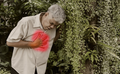 Elderly man has severe chest pain, which causes reflux of stomach acid : Old man suffers from...