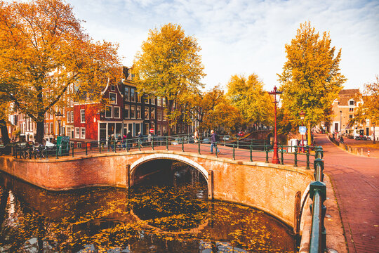 postcard picture of beautiful canals and traditional Dutch buildings in Amsterdam, the Netherlands