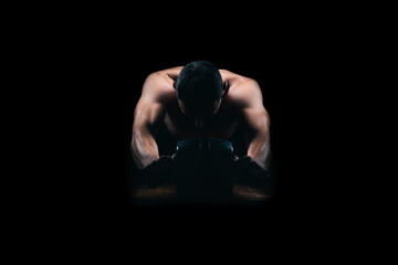 Strong man using an abs roller