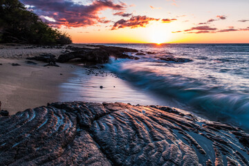 Waves Washing Over Ancient Lava Flows on Kapalaoa Beach at Sunset, Anaehoʻomalu Bay, Hawaii...