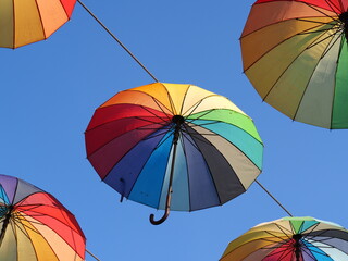 umbrellas in the sky at street