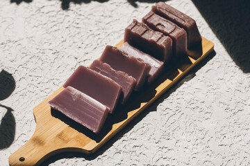 handmade soap and lavender on concrete background 