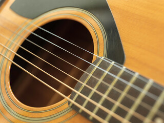 Obraz premium Acoustic Guitar strings close-up. macro photography of musical instruments.
