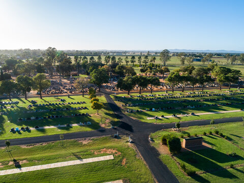 Aerial image of rural country cemetery with space for new graves and green lawn