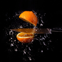 orange in water splash, orange, action, 
movement