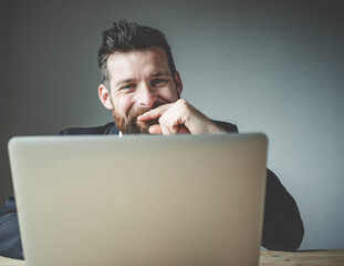 portrait of successful businessman in office