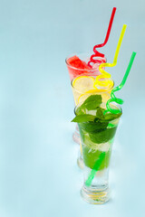 Refreshing summer drinks. Fresh drinks with ice. Cold lemonades: watermelon lemonade, lemon and...