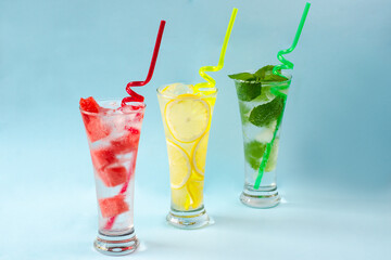 Refreshing summer drinks. Fresh drinks with ice. Cold lemonades: watermelon lemonade, lemon and mint are the best to quench your thirst in the summer heat. Watermelon, lemon, mint. Close-up. Copyspace