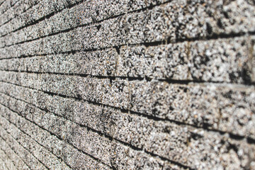 Fototapeta premium Un mur de brique grise