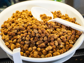 Blackberry. Dried muesli berries to add to porridge or yogurt. Healthy food concept, vegetarianism