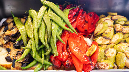 Grilled vegetable mix: delicious eggplants, zucchini, red and green peppers. healthy diet food concept, vegetarianism