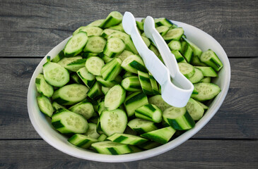 Cucumbers. green vegetables are in a white plate. healthy diet food concept, vegetarianism
