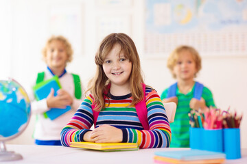 Fototapeta premium Kids in school. Children in class.