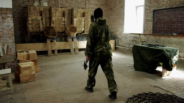 Throwing a sapper shovel, a soldier of the special forces