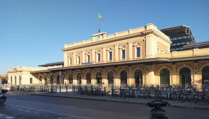 View of the main facade of the train station in Parma, Italy - obrazy, fototapety, plakaty