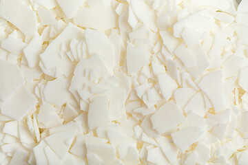 Flatlay with organic white soy wax flakes. Handmade candles, diy, hobby idea - obrazy, fototapety, plakaty