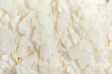 Fotobehang Flatlay with organic white soy wax flakes. Handmade candles, diy, hobby idea © netrun78