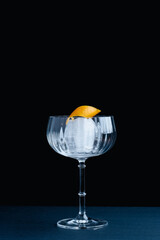 Lemon zest in the empty glass - 446969204