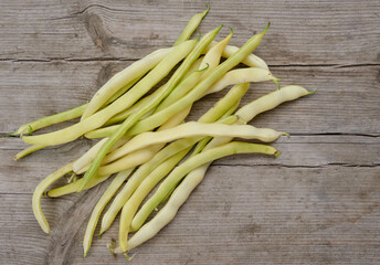 yellow beans on wooden background