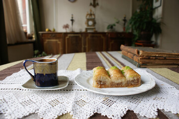 black coffee mug. a small cup of black classic coffee at home in a vintage cup
