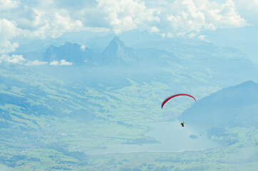 Paraglider over the mountains