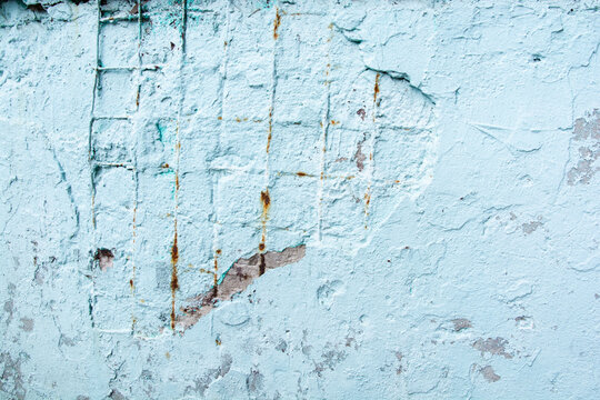 solid background Blue concrete surface with cracks and visible rusty reinforcement for collage